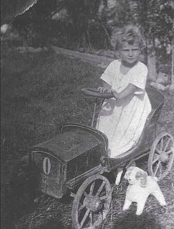 Eva Rappaport, founder of Kings Valley Collies in Oregon, as a child with stuffed dog, Flocky.